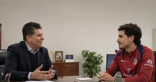 Carlos Emilio González junto a José María Giménez.