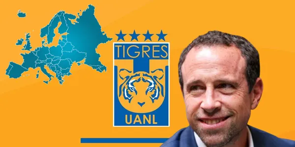Gerardo Torrado junto al escudo de Tigres / FOTO MEDIOTIEMPO