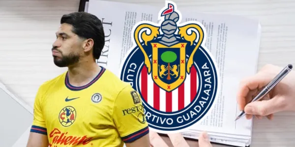 Henry Martin junto al escudo de Chivas / FOTO RÉCORD