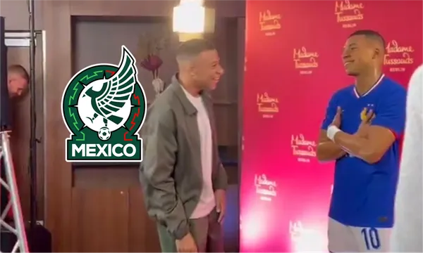 Mbappé observa a la figura de cera que le hicieron en un museo en Berlín