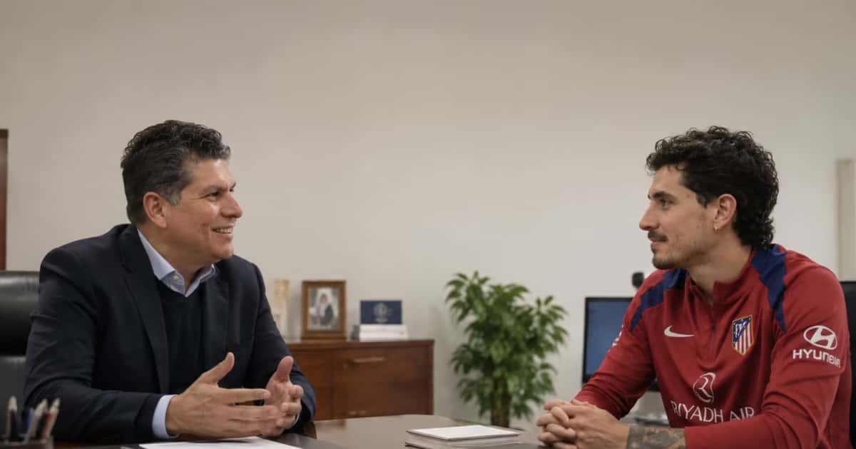 Carlos Emilio González junto a José María Giménez.